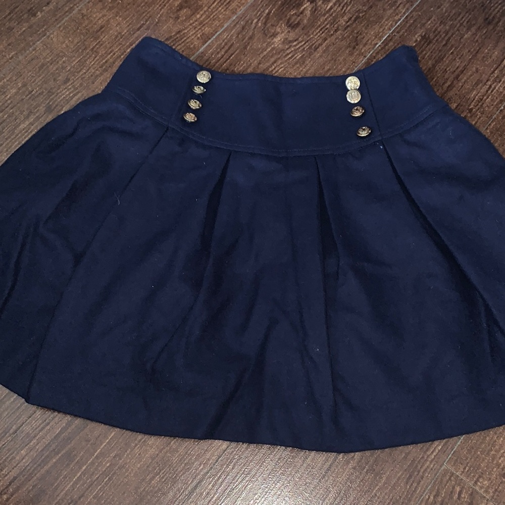 Juniors Navy Pleaded skirt